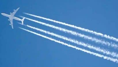 plane leaving a condensation trail