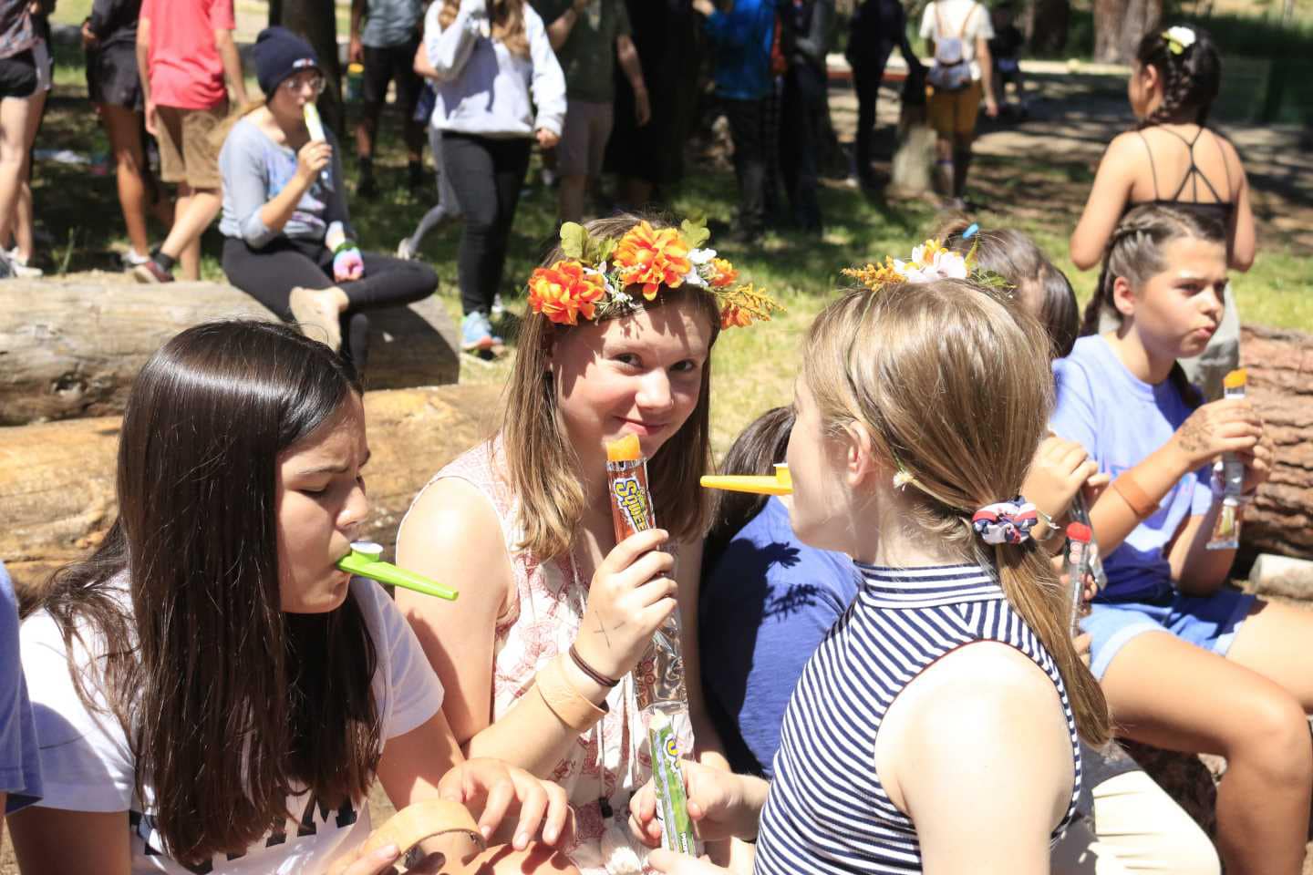 Girl smiling with others.