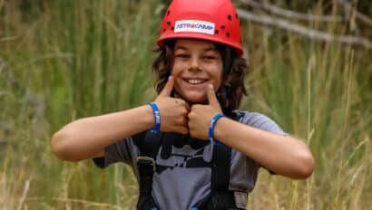 Boys with thumbs up.